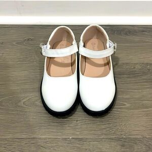 White girls mary Jane’s track sole